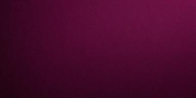 The primary subject of the image is a purple background. The setting is a dark room, and the visual style is a close-up of the purple background. The colors and mood of the image are predominantly purple, creating a calm and serene atmosphere.