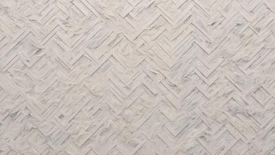 The primary subject of the image is a large, intricate, and textured wallpaper design. The wallpaper features a pattern of interlocking diamond shapes, creating a visually appealing and unique design. The setting is a room with a white background, which highlights the wallpaper's texture and pattern. The visual style of the image is a close-up of the wallpaper, showcasing its details and craftsmanship. The colors and mood of the image are predominantly white, giving it a clean and elegant appearance.