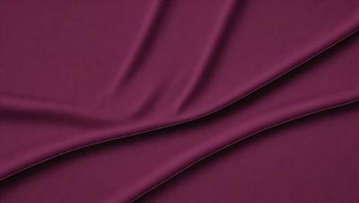 The primary subject of the image is a purple fabric, which is the main object, scene, or focus of the image. The setting or background is a purple cloth, and the visual style is a close-up of the purple fabric. The colors and mood of the image are predominantly purple, creating a calm and soothing atmosphere.