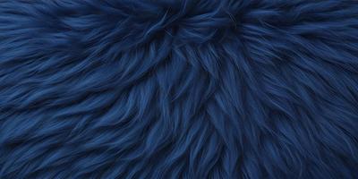 The primary subject of the image is a blue, furry, and fluffy object. The setting is a close-up of the object, which appears to be a piece of fabric or a textured surface. The visual style is a detailed, up-close view of the blue object. The colors and mood of the image are predominantly blue, creating a calm and serene atmosphere.