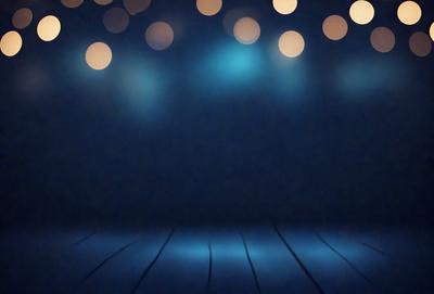 The primary subject of the image is a stage with a blue background. The setting is a theater or a stage, and the visual style is a photo. The dominant colors are blue and black, creating a dramatic and moody atmosphere.