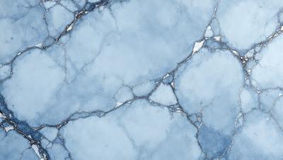 The primary subject of the image is a blue and white marble tile. The setting is a blue and white marble tile surface, which is the main object, scene, or focus of the image. The visual style is a photo, and the colors and mood are predominantly blue and white, creating a clean and elegant atmosphere.