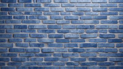 The primary subject of the image is a blue brick wall. The setting is a brick wall, and the visual style is a photo. The dominant colors are blue and white, creating a calm and serene atmosphere.