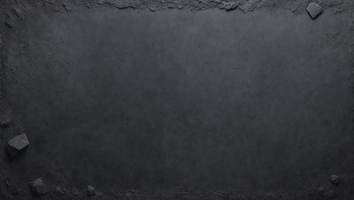 The primary subject of the image is a large, empty, and dark gray surface. The setting is a black background, and the visual style appears to be a photo. The colors and mood of the image are predominantly dark and moody, with the gray surface creating a sense of emptiness or mystery.