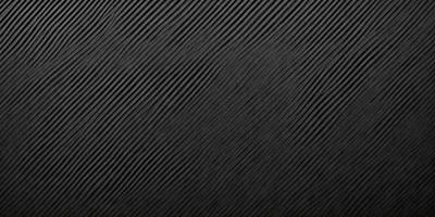 The primary subject of the image is a black and white patterned surface. The setting is a black background, and the visual style is a patterned texture. The dominant colors are black and white, creating a mood of simplicity and elegance.