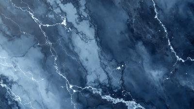 The primary subject of the image is a blue marble surface with a pattern of white streaks. The setting is a dark, possibly black, background. The visual style appears to be a photo of the marble surface. The colors and mood of the image are predominantly dark and moody, with the blue marble and white streaks providing a contrasting element.