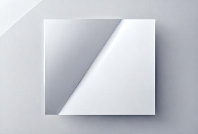 The primary subject of the image is a square white paper with a triangle cut out of it. The paper is placed on a white surface, which creates a clean and minimalist appearance. The visual style of the image is a simple, flat design, with no intricate details or textures. The colors and mood of the image are predominantly white, giving it a calm and uncluttered feel.