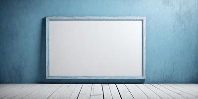 The primary subject of the image is a large white board or canvas, which is placed on a wooden table. The setting is a room with a blue wall, creating a contrasting backdrop. The visual style of the image is a photo, capturing the details of the white board and the wooden table. The colors and mood of the image are predominantly white and blue, giving it a clean and calm atmosphere.