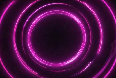 The primary subject of the image is a pink circle, which appears to be a neon sign or a light source. The setting is a dark background, which contrasts with the bright pink circle. The visual style is a close-up of the pink circle, emphasizing its vibrant color. The colors and mood of the image are predominantly pink, creating a warm and inviting atmosphere.