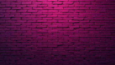 The primary subject of the image is a brick wall, which is the main object, scene, or focus of the image. The setting/background is a brick wall, and the visual style is a photo. The dominant colors and overall atmosphere are pink and purple, creating a warm and vibrant mood.