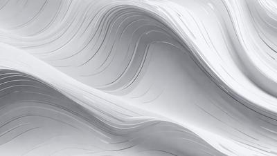 The primary subject of the image is a large, white, curved sheet of paper. The paper appears to be folded or curled, creating a visually interesting and dynamic shape. The setting is a gray background, which contrasts with the white paper, emphasizing its shape and texture. The visual style of the image is a close-up of the paper, showcasing its intricate details. The colors and mood of the image are predominantly white and gray, giving it a clean and minimalist appearance.