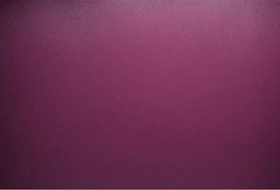 The primary subject of the image is a close-up of a purple wall. The setting is a room with a purple wall, and the visual style is a photo. The dominant colors in the image are purple, and the overall atmosphere is calm and serene.