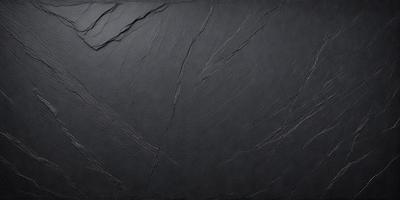 The primary subject of the image is a black leather surface, which appears to be a leather-like material or a leather-textured wall. The setting is a dark room, and the visual style is a close-up of the leather surface. The colors and mood of the image are predominantly dark, with the black leather surface being the main focus.
