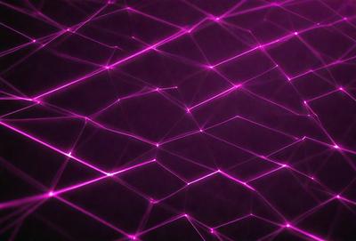 The primary subject of the image is a purple background with a pattern of pink and purple lines. The setting is a dark background, which contrasts with the bright colors of the lines. The visual style is a combination of digital art and illustration, creating a unique and eye-catching design. The colors and mood of the image are predominantly purple and pink, giving it a vibrant and lively atmosphere.