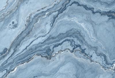 The primary subject of the image is a blue and white marble-like surface, which appears to be a patterned stone or a blue and white marble tile. The setting is a room with a blue and white marble wall, which adds to the overall atmosphere of the space. The visual style of the image is a close-up of the marble-like surface, showcasing its intricate patterns and textures. The colors and mood of the image are predominantly blue and white, creating a calm and serene atmosphere.