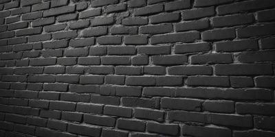 The primary subject of the image is a black brick wall. The setting is a dark room, and the visual style is a close-up of the brick wall. The colors and mood of the image are predominantly dark, with the black brick wall being the main focus.