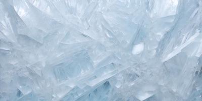 The primary subject of the image is a large, clear, and blue crystal. The setting is a blue background, which creates a striking contrast with the crystal. The visual style is a close-up of the crystal, showcasing its unique and intricate structure. The colors and mood of the image are predominantly blue, giving it a calm and serene atmosphere.