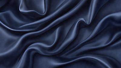 The primary subject of the image is a blue fabric, which appears to be a piece of cloth or a curtain. The setting is a room with a blue background, which adds to the overall atmosphere. The visual style of the image is a close-up of the blue fabric, showcasing its texture and details. The colors and mood of the image are predominantly blue, creating a calm and serene atmosphere.