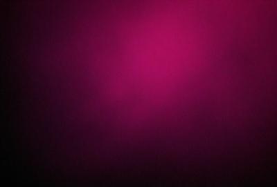 The primary subject of the image is a purple wall. The setting is a room with a purple background. The visual style is a close-up of the purple wall, which gives a sense of depth and texture. The colors and mood of the image are predominantly purple, creating a calm and serene atmosphere.