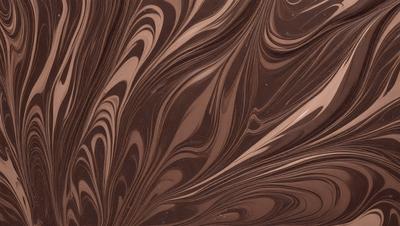 The primary subject of the image is a close-up of a chocolate-covered cake. The cake is decorated with swirls and patterns, giving it a visually appealing and appetizing appearance. The setting is a table, and the visual style is a close-up of the cake, emphasizing its details. The colors and mood of the image are predominantly brown, which is consistent with the chocolate theme of the cake.