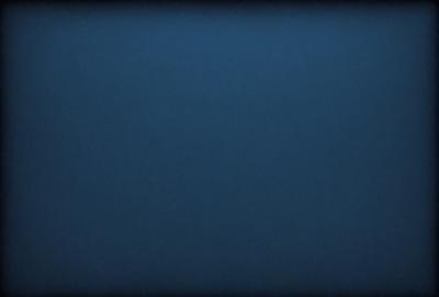 The primary subject of the image is a blue sky. The setting is a vast, open space with no visible landmarks or objects. The visual style is a natural, outdoor scene. The colors and mood are predominantly blue, creating a calm and serene atmosphere.