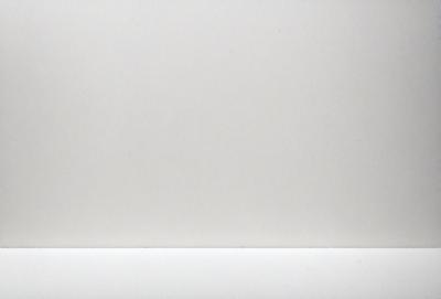 The primary subject of the image is a white sheet of paper. The setting is a blank, white background, which creates a clean and minimalist visual style. The colors in the image are predominantly white, giving it a calm and serene atmosphere.