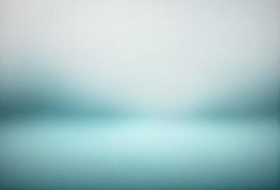 The primary subject of the image is a large body of water, which appears to be a vast ocean. The setting is a cloudy sky, creating a moody atmosphere. The visual style is a photo, capturing the beauty of the ocean and the sky. The colors are predominantly blue, with some grays and whites, reflecting the calmness and vastness of the ocean.
