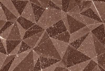 The primary subject of the image is a close-up of a brown marbled surface, which appears to be a patterned stone or tile. The setting is a room with a brown floor, and the visual style is a close-up of the marbled surface. The colors and mood of the image are warm and earthy, with the brown marbled surface being the dominant color.