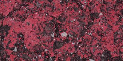 The primary subject of the image is a close-up of a red and black marbled surface. The setting is a rocky, textured surface, possibly a stone or marble countertop. The visual style is a close-up of the marbled surface, showcasing its intricate patterns and textures. The dominant colors are red and black, creating a bold and striking appearance.