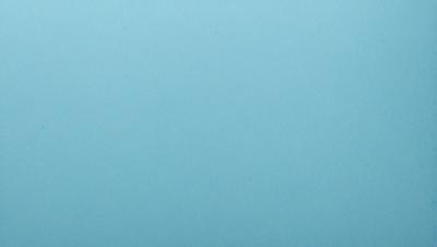 The primary subject of the image is a large, empty blue space. The setting is a blue background, which creates a sense of depth and openness. The visual style is a close-up of the blue background, emphasizing the color and texture. The colors and mood of the image are predominantly blue, which can evoke feelings of calmness, tranquility, or even a sense of mystery.