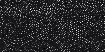The primary subject of the image is a black and white polka dot pattern. The setting is a black background, and the visual style is a pattern. The dominant colors are black and white, and the overall atmosphere is a classic and timeless design.