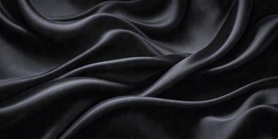 The primary subject of the image is a black fabric, which appears to be a piece of cloth or a curtain. The setting is a dark room, and the visual style is a close-up of the fabric. The colors and mood of the image are predominantly dark and moody, with the black fabric being the main focus.