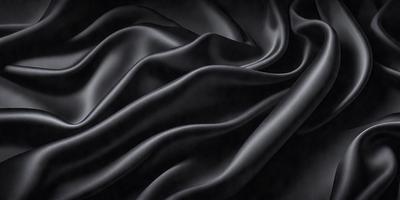 The primary subject of the image is a black fabric, which is the main object, scene, or focus of the image. The setting or background is a dark room, and the visual style is a black and white photo. The colors and mood of the image are predominantly dark and moody, with the black fabric as the main element.