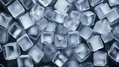 The primary subject of the image is a large number of ice cubes. The ice cubes are arranged in a pattern, creating a visually appealing scene. The setting is a dark background, which contrasts with the bright white color of the ice cubes. The visual style of the image is a close-up of the ice cubes, showcasing their intricate patterns and textures. The overall atmosphere of the image is cool and refreshing, as the ice cubes evoke the feeling of cold weather and frozen treats.