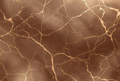 The primary subject of the image is a close-up of a marble surface with a gold-like texture. The setting is a room with a brown background. The visual style is a photo of the marble surface, showcasing its unique texture and color. The colors and mood of the image are warm and inviting, with the gold-like texture adding a touch of luxury and sophistication.