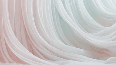 The primary subject of the image is a white curtain, which is the main object, scene, or focus of the image. The curtain is hanging in front of a wall, creating a sense of depth and dimension. The setting or background of the image is a room with a wall, and the visual style appears to be a photo. The colors and mood of the image are predominantly white, giving it a clean and serene atmosphere.