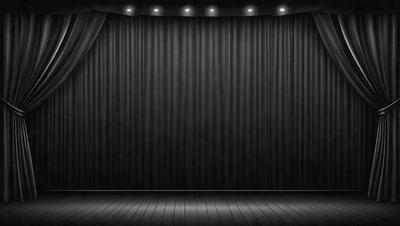 The primary subject of the image is a black and white curtain, which is the main object in the scene. The setting is a stage or theater, with the curtain hanging in front of it. The visual style is a black and white photo, giving the image a classic and timeless appearance. The colors and mood of the image are predominantly dark and dramatic, creating a sense of mystery and anticipation.