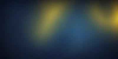 The primary subject of the image is a blue background with two yellow lights shining on it. The setting appears to be a dark room, and the visual style is a combination of a photo and digital art. The dominant colors are blue and yellow, creating a calm and serene atmosphere.