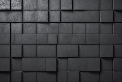 The primary subject of the image is a black brick wall. The setting is a dark room, and the visual style is a close-up of the brick wall. The colors and mood of the image are predominantly dark and moody, with the black brick wall being the main focus.