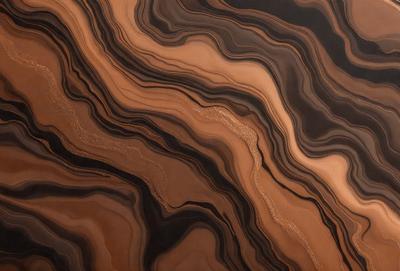 The primary subject of the image is a close-up of a marble stone, showcasing its intricate patterns and textures. The setting is a dark background, which highlights the marble's natural beauty. The visual style is a close-up, focusing on the details of the marble. The colors and mood of the image are predominantly dark, with the marble serving as the main focal point.