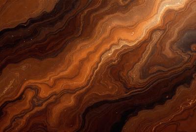 The primary subject of the image is a close-up of a marbled stone surface. The setting is a natural environment, with the stone surface being the main focus of the image. The visual style is a close-up, which emphasizes the intricate patterns and textures of the marbled stone. The colors and mood of the image are warm and earthy, with the marbled stone surface being the dominant color.
