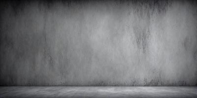 The primary subject of the image is a large, gray concrete wall. The setting is a plain, empty room with the wall as the main focus. The visual style is a photo, capturing the concrete wall in its natural environment. The colors and mood of the image are predominantly gray and neutral, giving it a somewhat dull and uninviting atmosphere.