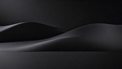 The primary subject of the image is a black and white drawing of a mountain. The setting is a black background, which emphasizes the mountain's shape and form. The visual style is a combination of digital art and illustration, creating a striking contrast between the mountain and the background. The colors and mood of the image are predominantly dark, with the mountain drawing being the main focus and the black background providing a dramatic and moody atmosphere.