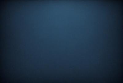 The primary subject of the image is a blue background. The setting is a dark, empty space with no visible objects or people. The visual style is a simple, monochromatic design. The colors and mood are predominantly dark and moody, with the blue background creating a sense of depth and mystery.