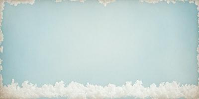 The primary subject of the image is a blue sky with white clouds. The setting is a clear day with a cloudy sky, creating a serene and peaceful atmosphere. The visual style is a photo, capturing the beauty of the natural environment. The colors and mood are predominantly blue and white, with the clouds adding a touch of warmth and softness to the scene.