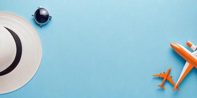 The primary subject of the image is a blue surface, which appears to be a wall or a piece of paper. The setting is a room with a blue background, and the visual style is a close-up of the blue surface. The colors and mood of the image are predominantly blue, creating a calm and serene atmosphere.