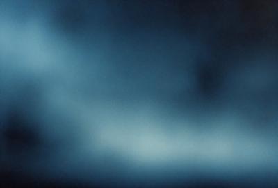 The primary subject of the image is a blue sky with clouds. The setting is a cloudy day, and the visual style is a photo. The dominant colors are blue and white, creating a calm and serene atmosphere.