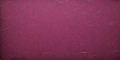 The primary subject of the image is a close-up of a red leather surface. The setting is a room with a wall painted in a shade of red. The visual style is a photo, and the dominant colors are red and pink. The overall atmosphere is warm and inviting.