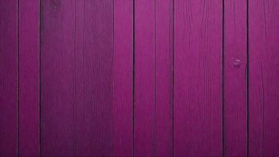 The primary subject of the image is a wooden wall with a purple stripe. The setting is a room with a wooden surface, and the visual style is a close-up of the wooden wall. The dominant colors are purple and brown, creating a warm and inviting atmosphere.