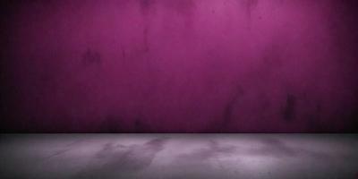 The primary subject of the image is a purple wall. The setting is a room with a purple wall, and the visual style is a photo. The dominant colors are purple and pink, creating a calm and soothing atmosphere.